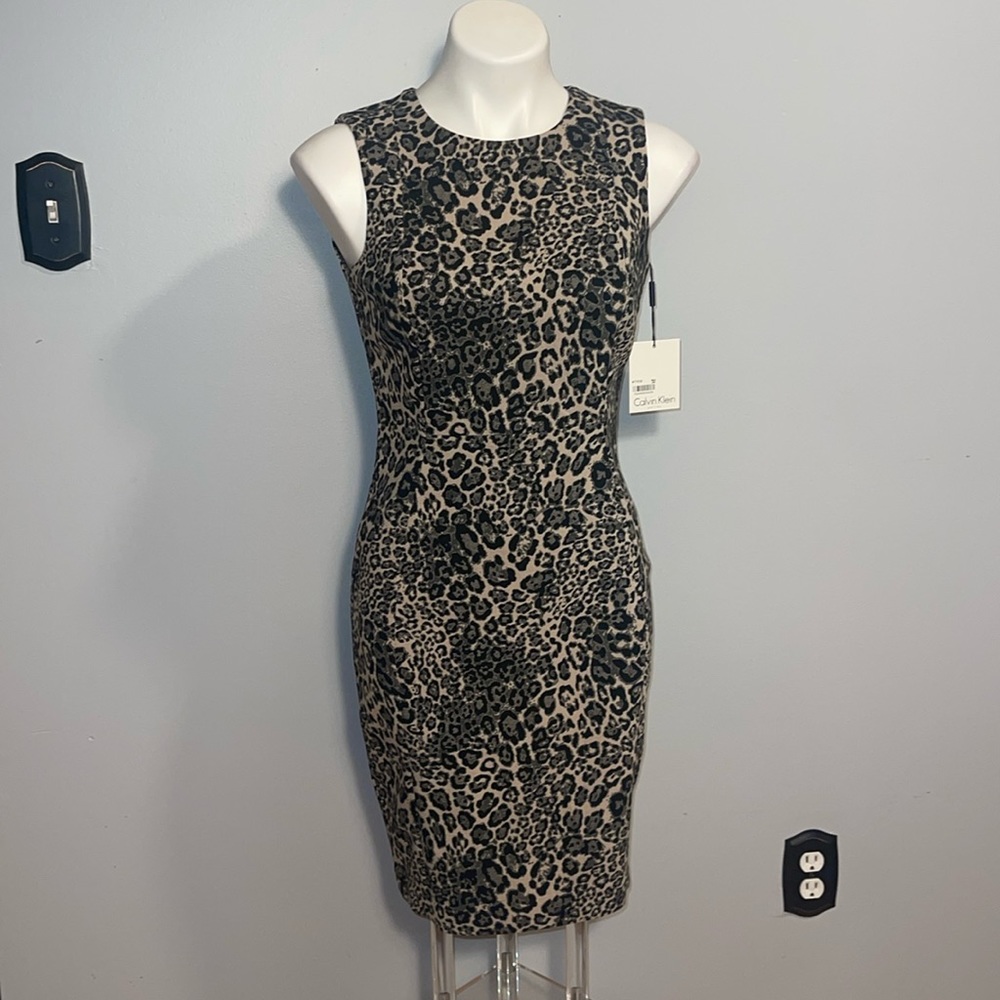 Calvin Klein ladies NWT leopard print sheath dress. Size 8 petite.